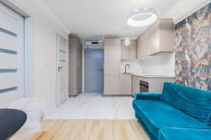 Kuchyň nebo kuchyňský kout v ubytování Apartament Zegrzyński z widokiem
