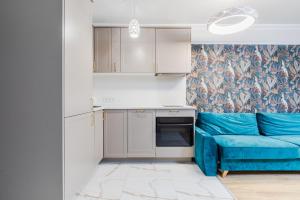 Kuchyň nebo kuchyňský kout v ubytování Apartament Zegrzyński z widokiem