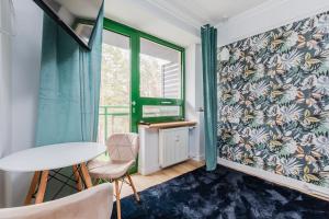 TV a/nebo společenská místnost v ubytování Apartament Zegrzyński z widokiem