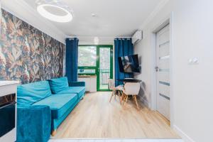 Posezení v ubytování Apartament Zegrzyński z widokiem + 12 fotografií
