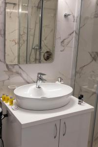 Koupelna v ubytování Comfortable Suites 2