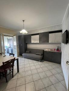 a living room with a couch and a table at Casa Piero in Lecce