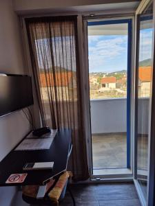 TV a/nebo společenská místnost v ubytování K-Rooms