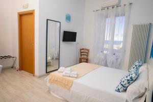 Voodi või voodid majutusasutuse Casa Junno toas