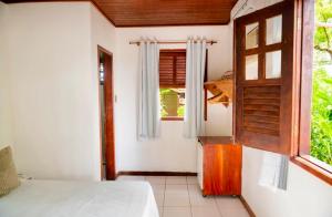 Letto o letti in una camera di Pousada Coco Dendê