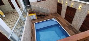 Swimmingpoolen hos eller tæt på Casas Ubatuba + 34 billeder