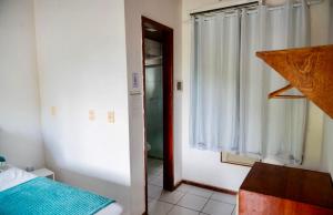 Letto o letti in una camera di Pousada Coco Dendê