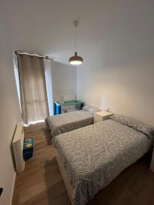 Posteľ alebo postele v izbe v ubytovaní Apart Residencial Pto de la Cruz