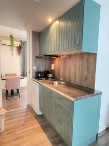 Guesthouse Ziel & Zaligheid 주방 또는 간이 주방