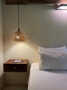 Cama ou camas em um quarto em La Posadita de Chacras
