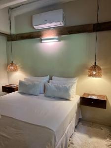 Cama ou camas em um quarto em La Posadita de Chacras