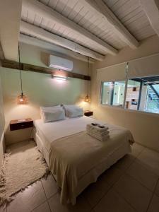 Cama ou camas em um quarto em La Posadita de Chacras