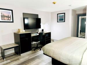 Voodi või voodid majutusasutuse Quality Inn Raynham - Taunton toas