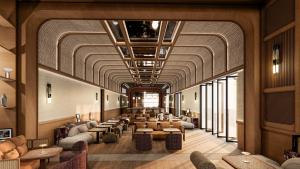 a waiting room with couches and tables and ceilings at Villa Sahrai, a Member of Design Hotels in Casablanca