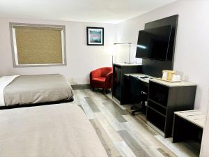 Voodi või voodid majutusasutuse Quality Inn Raynham - Taunton toas