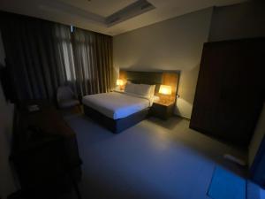 Saray Prime Suites客房内的一张或多张床位
