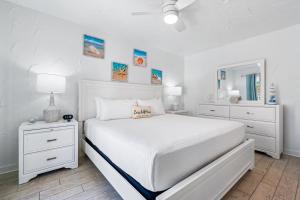 Postel nebo postele na pokoji v ubytování Crescent Beach Villas By Beachside Management + 45 fotografií