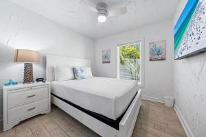 Postel nebo postele na pokoji v ubytování Crescent Beach Villas By Beachside Management