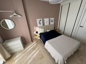 Postel nebo postele na pokoji v ubytování Piso Julia Playa