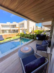 Πισίνα στο ή κοντά στο Casa Boho-Rota dos Milagres-Condomínio pé na areia