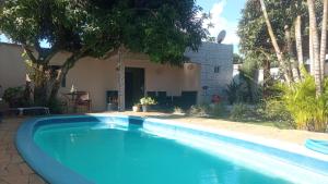 Bazén v ubytování Apartamento locação com piscina nebo v jeho okolí