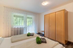 Postel nebo postele na pokoji v ubytování Fuchsmichelhof 2
