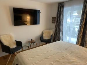 Postel nebo postele na pokoji v ubytování Haus Cäcilia