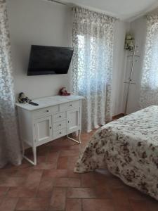 Postel nebo postele na pokoji v ubytování Agriturismo i Due Mori