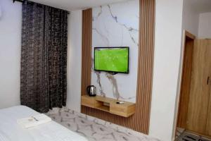 TV a/nebo společenská místnost v ubytování Hotel Padelia & apartment
