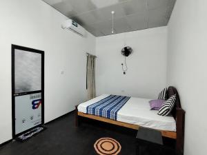 Postel nebo postele na pokoji v ubytování L3 Villa