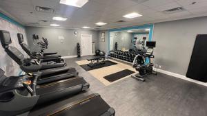 a gym with treadmills and cardio equipment in a room at Crowne Plaza Orlando-Downtown by IHG in Orlando