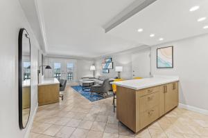 a room with a kitchen and a living room at Crowne Plaza Orlando-Downtown by IHG in Orlando