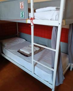 Postel nebo postele na pokoji v ubytování Qiyuan Hotel