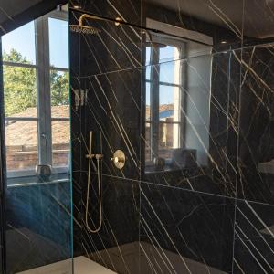 Koupelna v ubytování Le Boudoir du Beaujolais