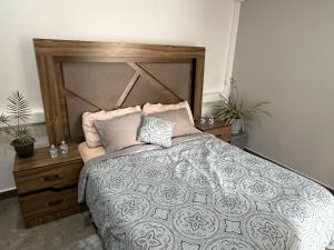 Postel nebo postele na pokoji v ubytování Suites vergel balcón