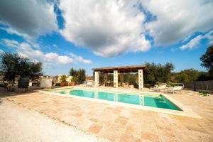 Bazén v ubytovaní IL Trullo Di Mamma Lucia-Luxury Villa alebo v jeho blízkosti