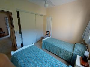 Postel nebo postele na pokoji v ubytování Apartamentos Valeria Medanos + 9 fotografií