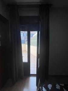 Postel nebo postele na pokoji v ubytování HostalLaPerdiz