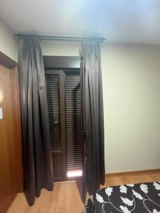 Postel nebo postele na pokoji v ubytování HostalLaPerdiz