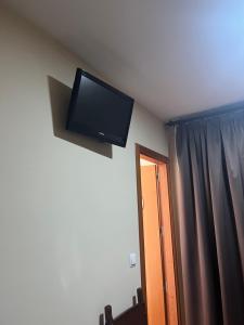 TV a/nebo společenská místnost v ubytování HostalLaPerdiz