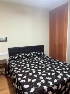 Postel nebo postele na pokoji v ubytování HostalLaPerdiz
