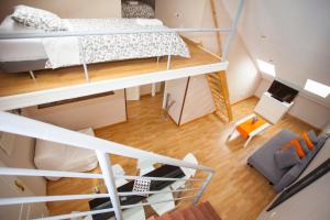 Łóżko lub łóżka w pokoju w obiekcie Fuencarral Apartments