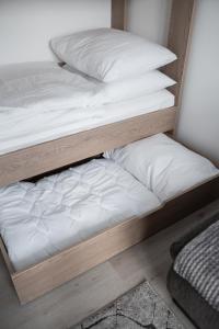 Letto o letti in una camera di Apartmán Radvanička