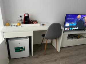TV a/nebo společenská místnost v ubytování Suite Los Castros