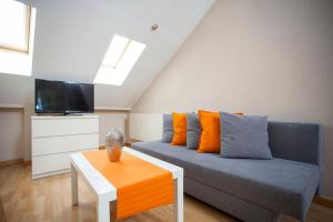 Telewizja i/lub zestaw kina domowego w obiekcie Fuencarral Apartments