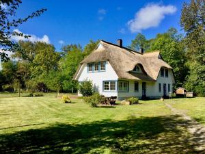 Κήπος έξω από το Straminke 4b Wohnung Strandläufer