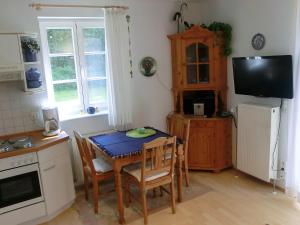 Kuchyň nebo kuchyňský kout v ubytování Achtern Diek Haus 11 Wohnung 1 + 4 fotografie