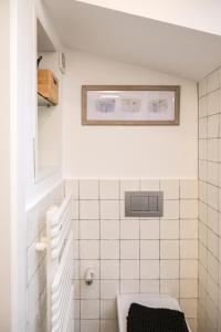 a bathroom with a sink and a toilet at El Call, Àtic con vistas al puente de Besalú in Besalú +41 photos