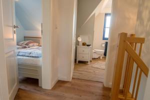 Postel nebo postele na pokoji v ubytování Wiesenstraße 65a Haus Casa Blue