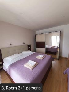 Posteľ alebo postele v izbe v ubytovaní Apartmens Beach house + 14 fotografií